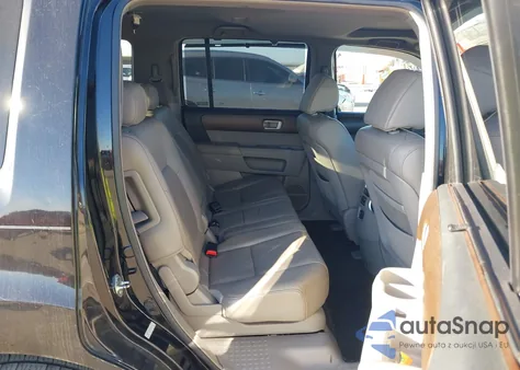 2009 Honda Pilot Touring z USA, uszkodzony, nr VIN 5FNYF38879B008110